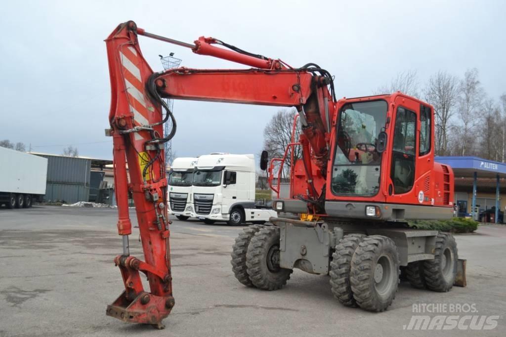 Komatsu PW 148-8 حفارات بعجل