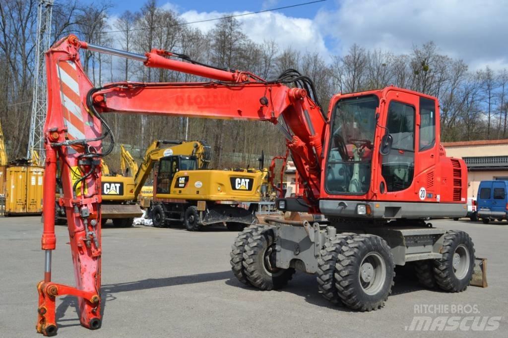 Komatsu PW 148-8 حفارات بعجل