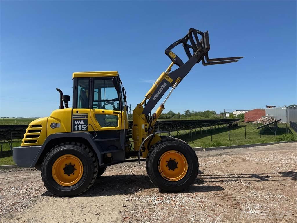Komatsu  لوادر بعجل