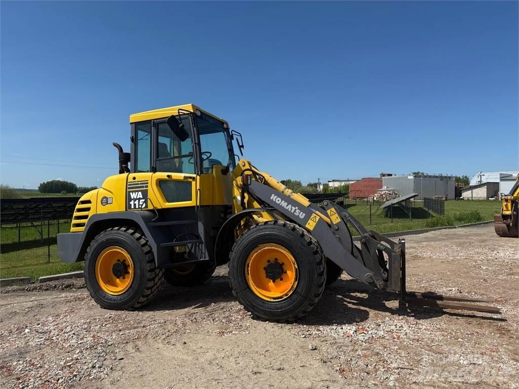 Komatsu  لوادر بعجل