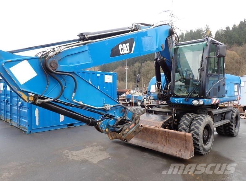CAT M322D حفارات بعجل