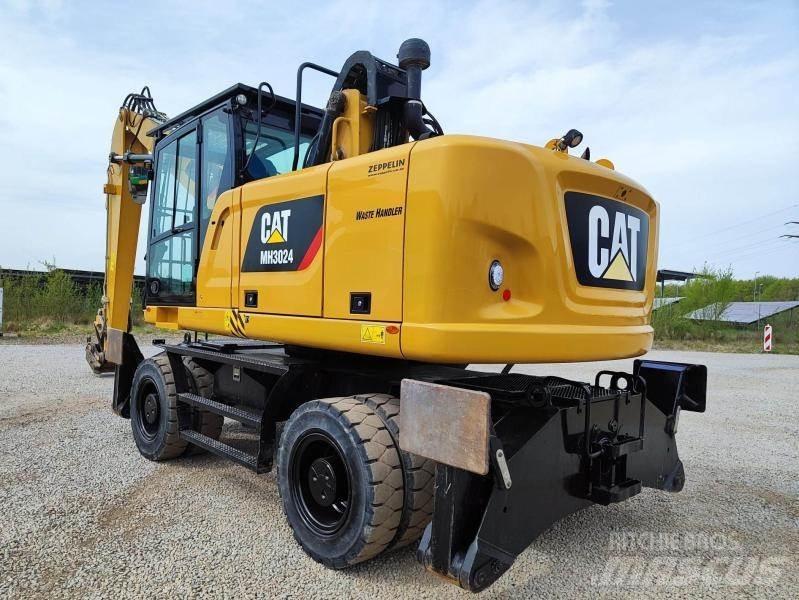 CAT MH3024 مناولات المخلفات / مناولات صناعية