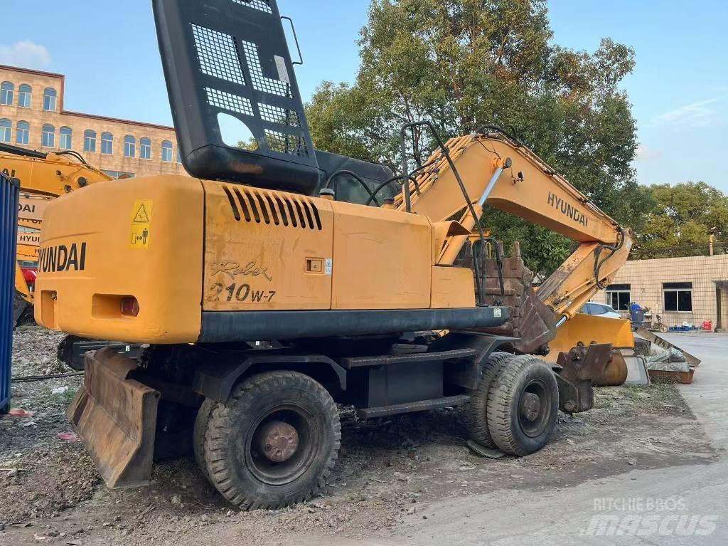 Hyundai R210W-7 حفارات بعجل