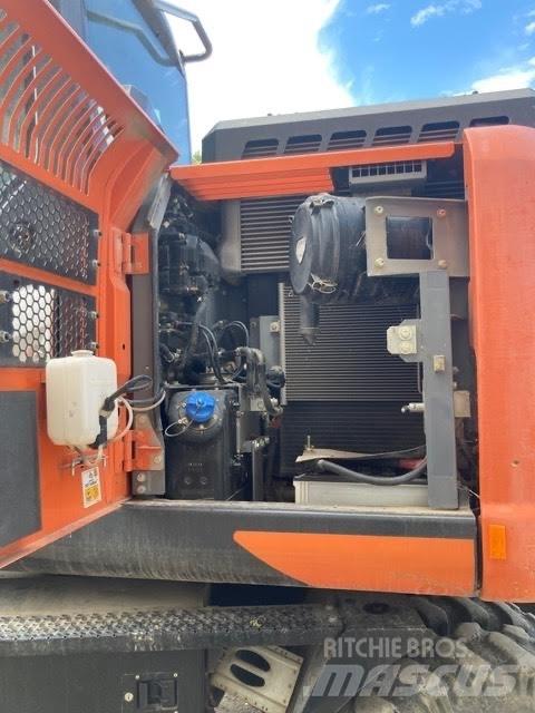 Hitachi ZX 145 W-6 حفارات بعجل