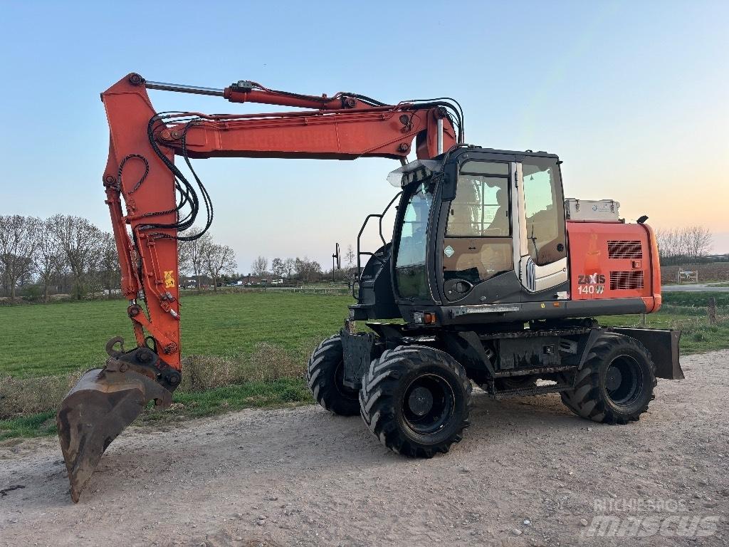 Hitachi ZX 140 W T-3 حفارات بعجل