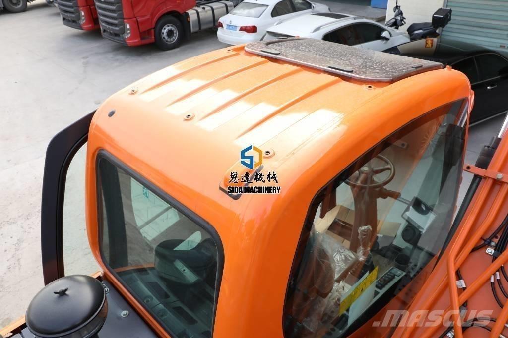 Develon DX125W حفارات بعجل