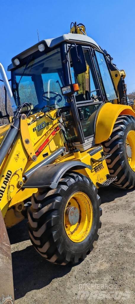 New Holland LB 110 B لوادر ذات جرافات عكسية