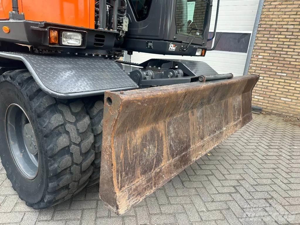 Doosan DX140W-5 حفارات بعجل