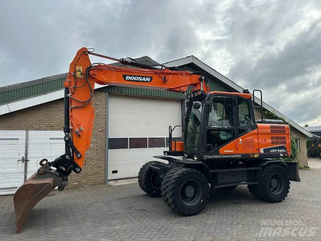 Doosan DX140W-5 حفارات بعجل