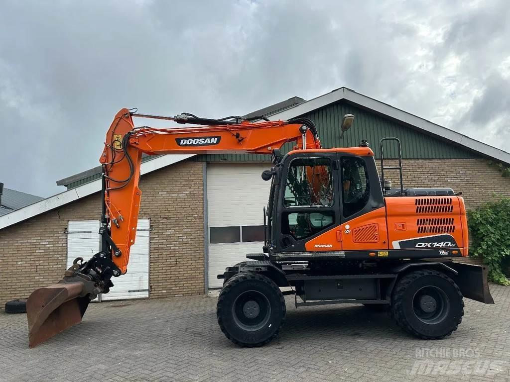 Doosan DX140W-5 حفارات بعجل