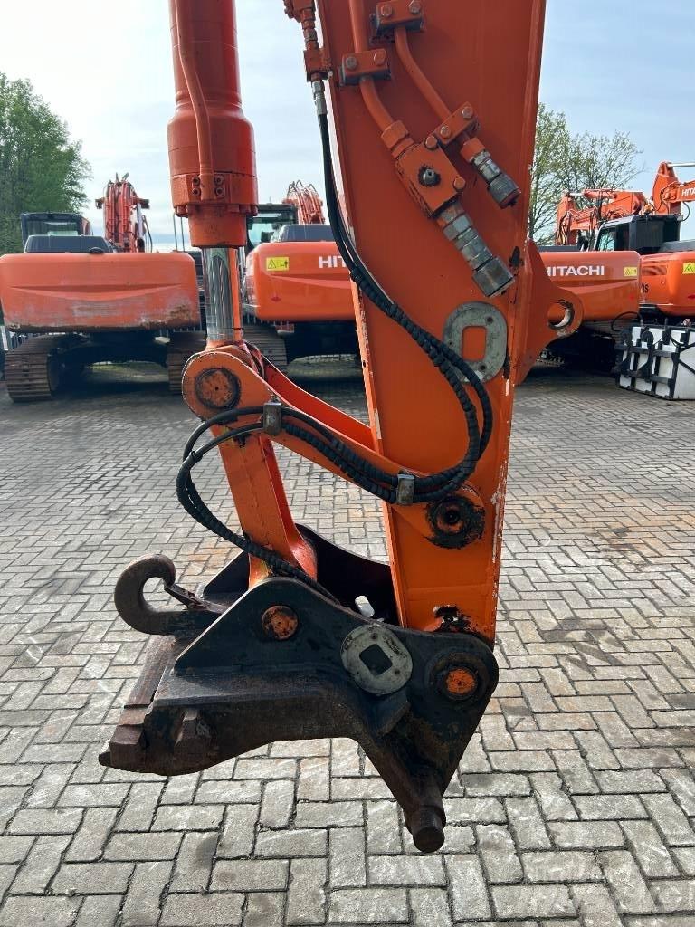 Hitachi ZX 140 W-3 حفارات بعجل