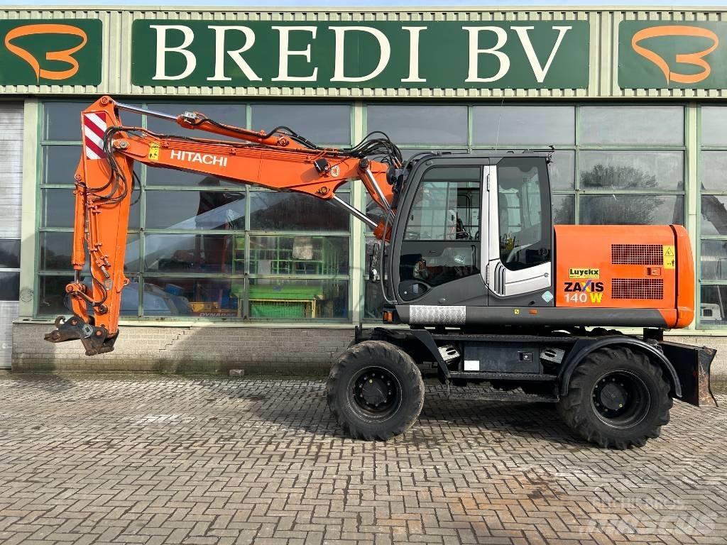 Hitachi ZX 140 W-3 حفارات بعجل