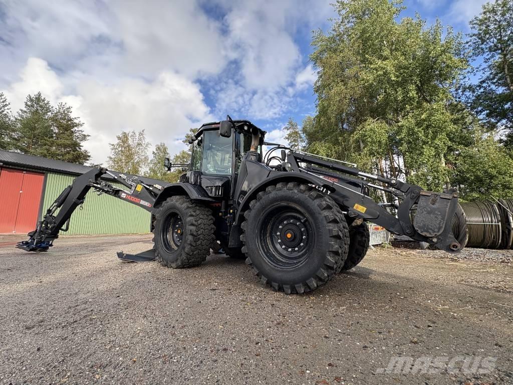Huddig 1260 D لوادر ذات جرافات عكسية