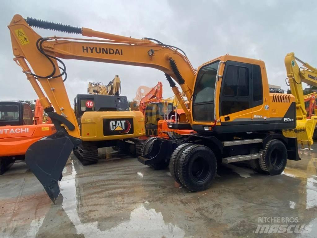 Hyundai 150W-9 حفارات بعجل