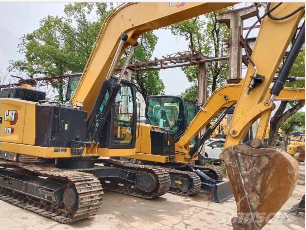 CAT 310 حفارات زحافة