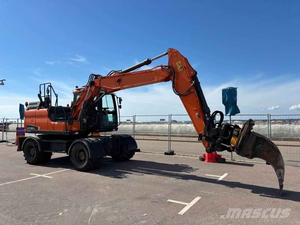 Doosan DX 160 W حفارات بعجل