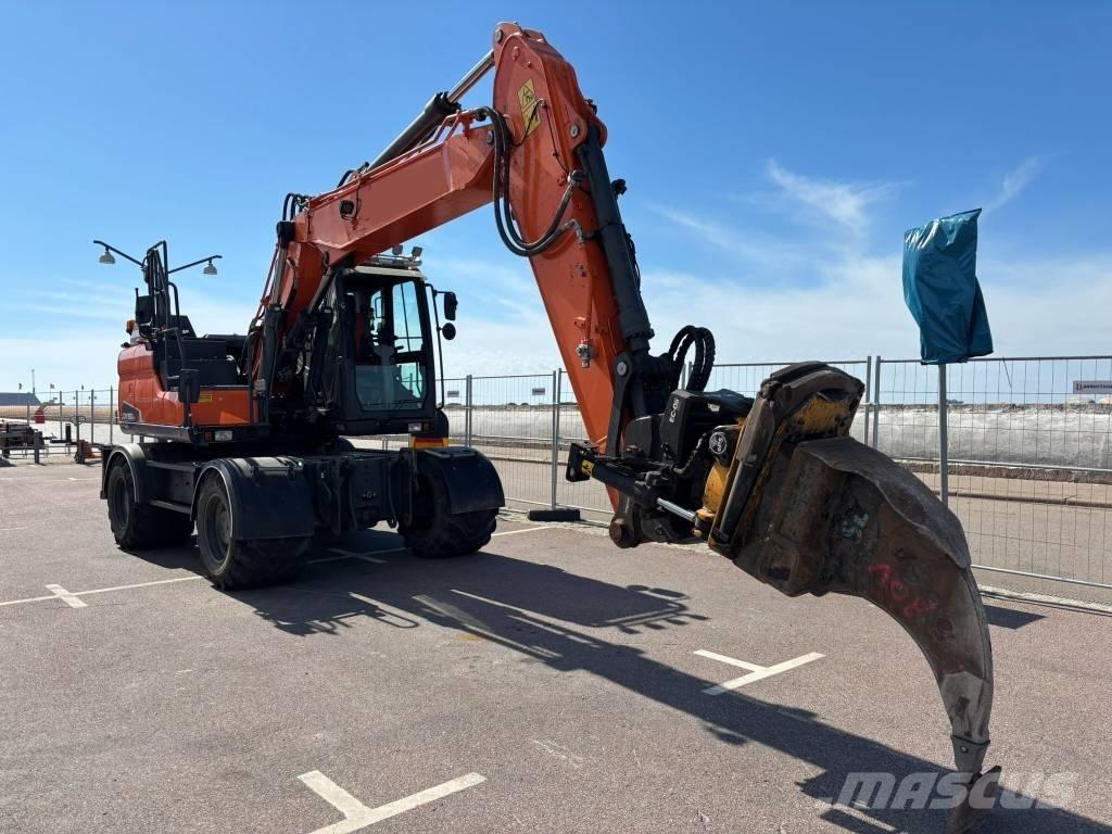 Doosan DX 160 W حفارات بعجل