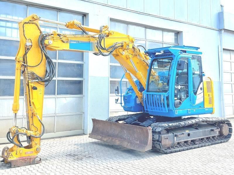 Hitachi ZX 135 US-6 حفارات زحافة