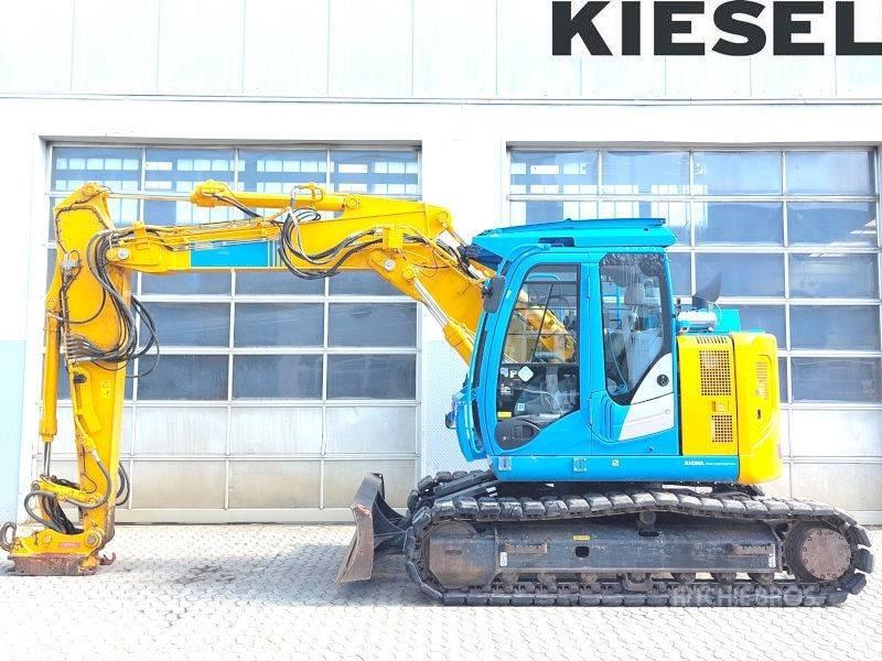 Hitachi ZX 135 US-6 حفارات زحافة