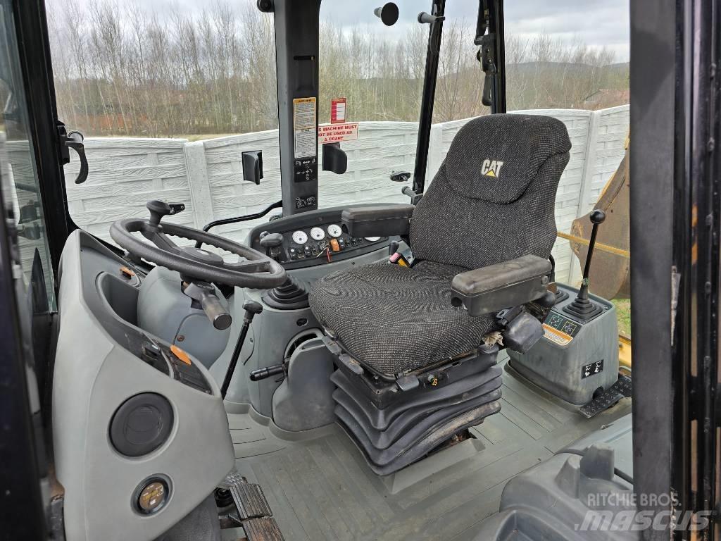 CAT 428 D لوادر ذات جرافات عكسية