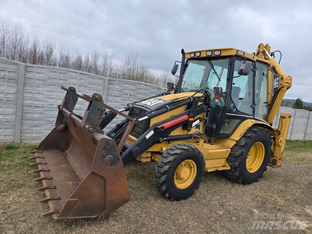CAT 428 D لوادر ذات جرافات عكسية