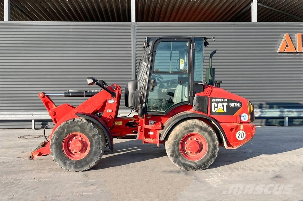 CAT 907H2 لوادر بعجل