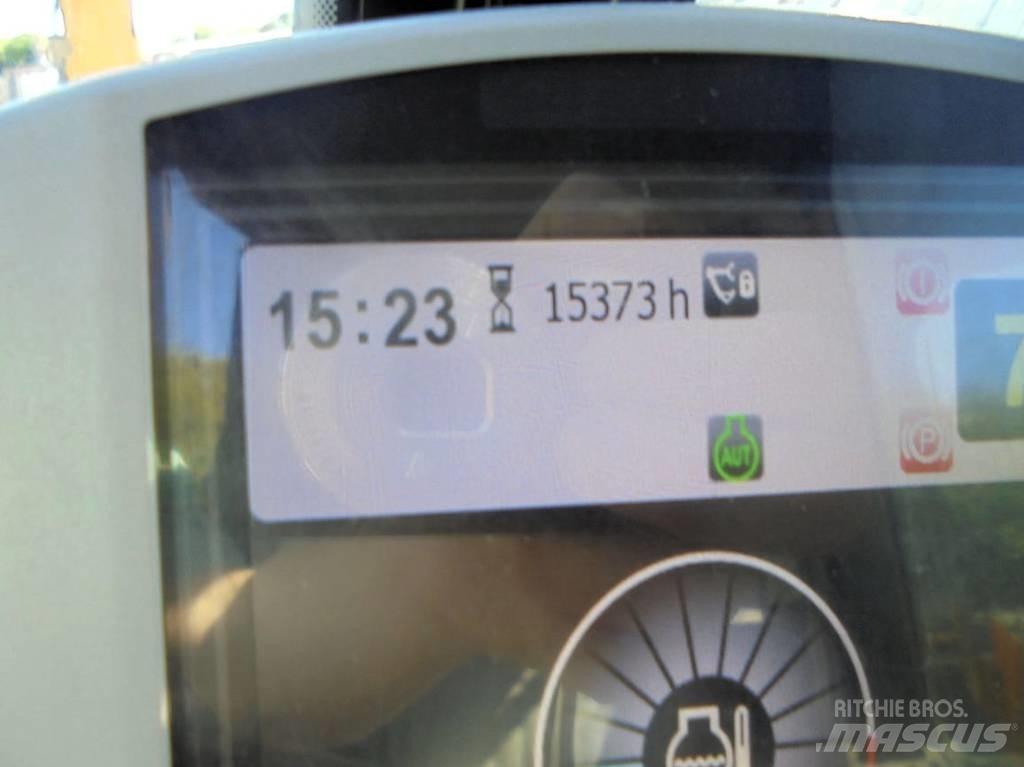 CAT M 322 D حفارات بعجل