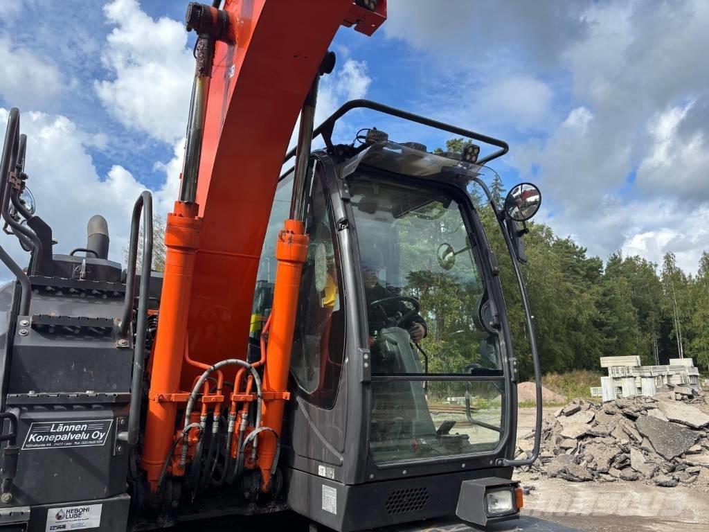 Hitachi ZX 140 W-6 حفارات بعجل