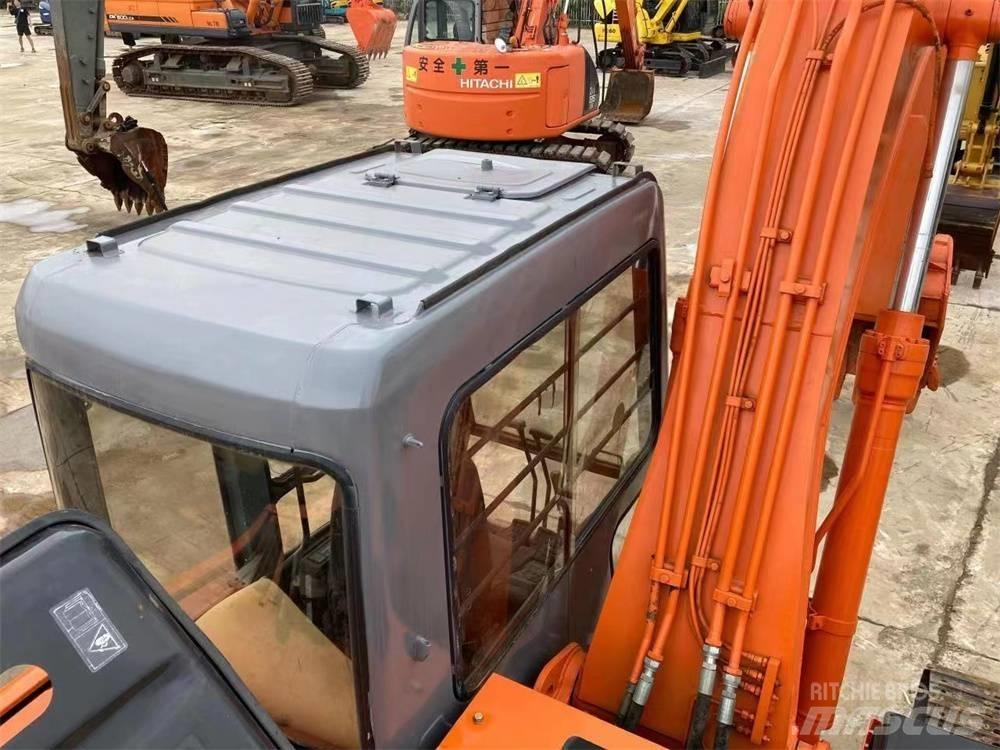 Hitachi EX 1200 حفارات زحافة