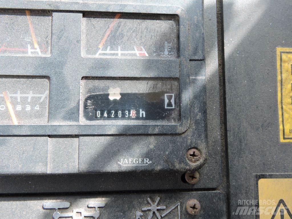 New Holland TX34 حصادات