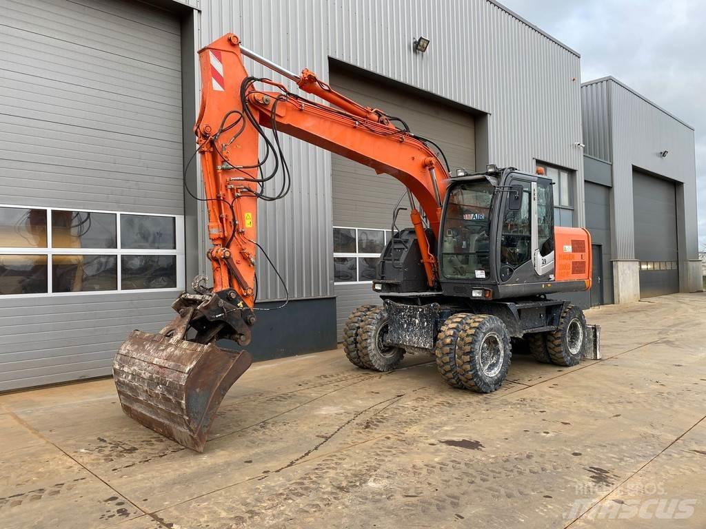 Hitachi ZX140W-3 حفارات بعجل