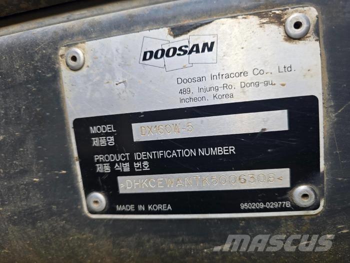 Doosan DX 140 W-5 حفارات بعجل
