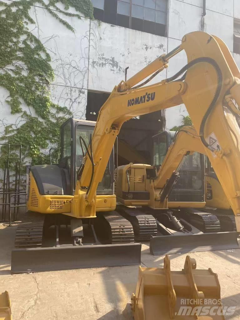Komatsu PC 55 حفارات زحافة