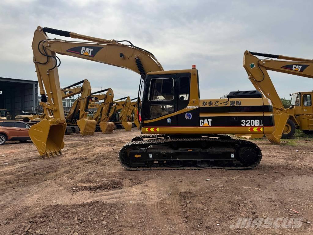 CAT 320 B L حفارات زحافة