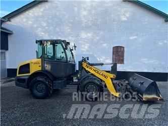 New Holland W 50 C لوادر بعجل