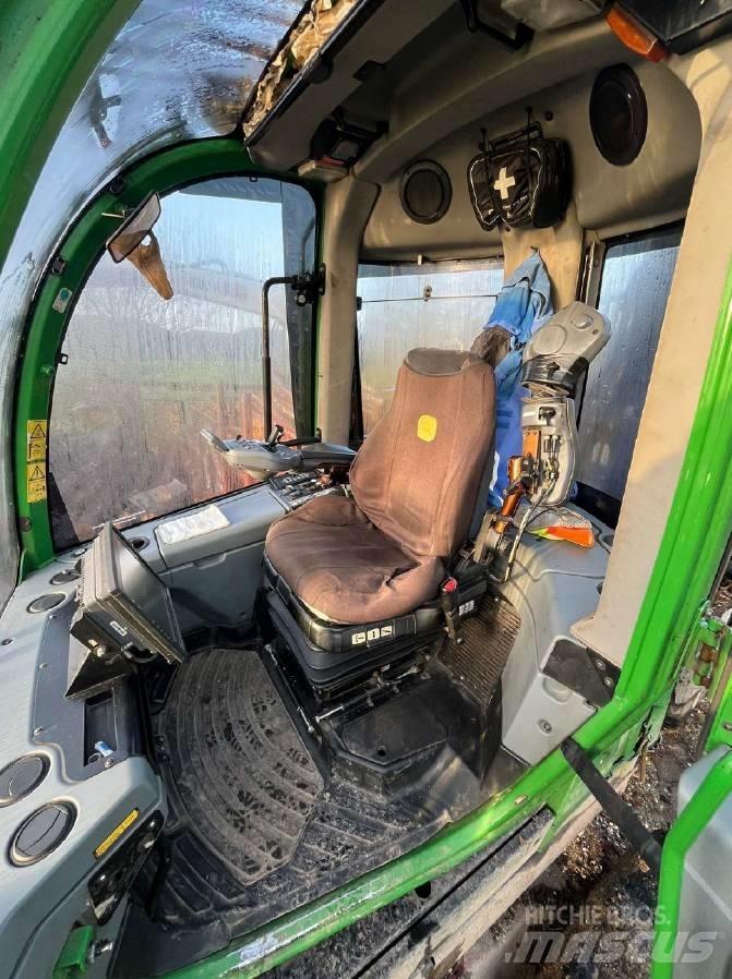 John Deere 1110 E شاحنات