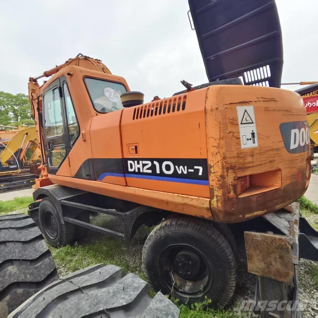 Doosan DH 210 W-7 حفارات بعجل