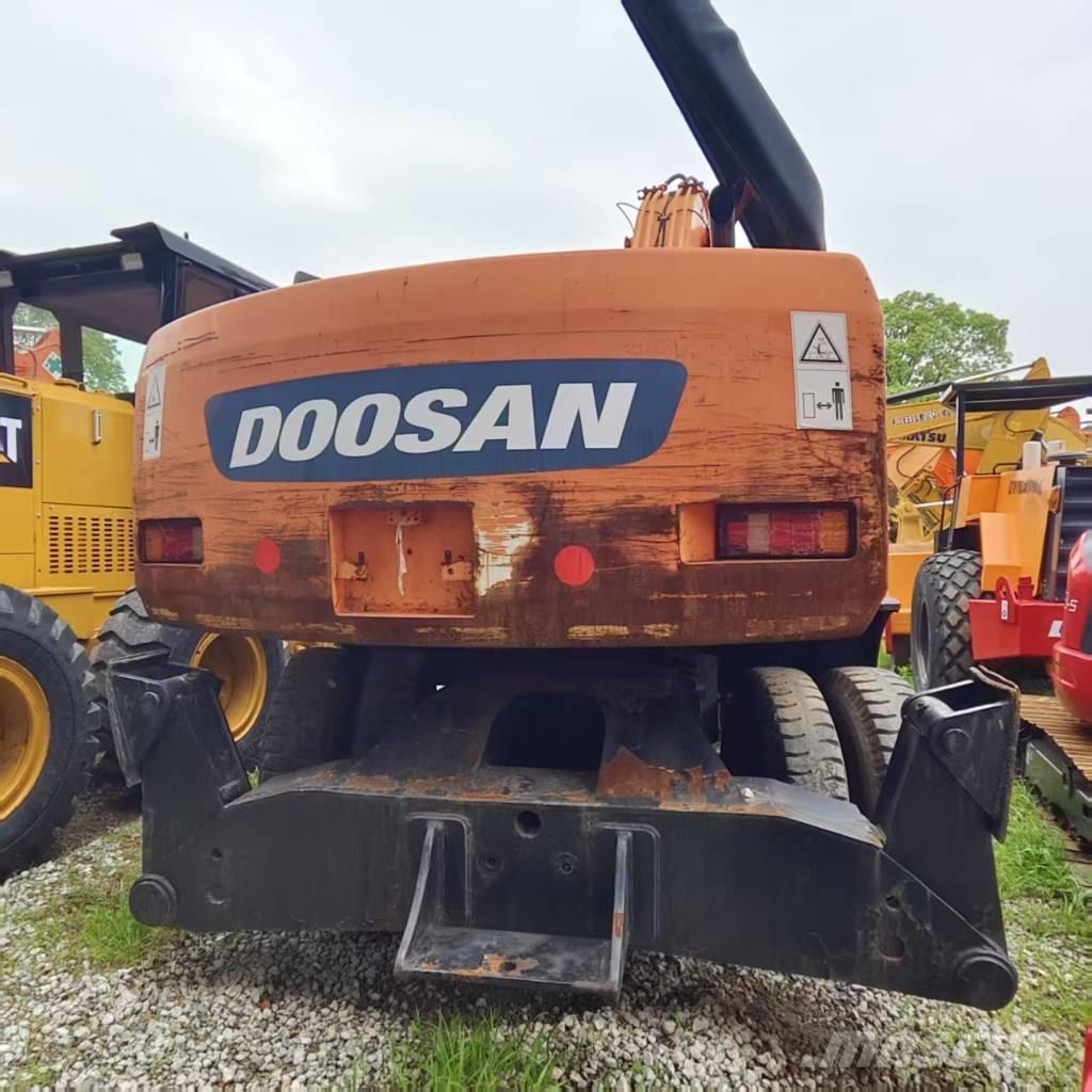 Doosan DH 210 W-7 حفارات بعجل