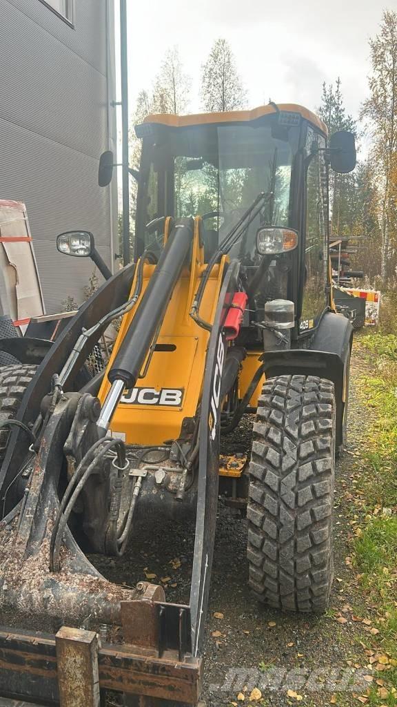 JCB 409 لوادر بعجل