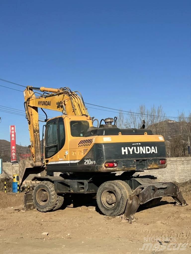 Hyundai R210W-9 حفارات بعجل