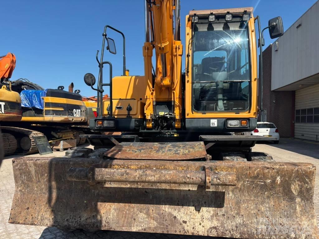 Hyundai 140W-9A حفارات بعجل