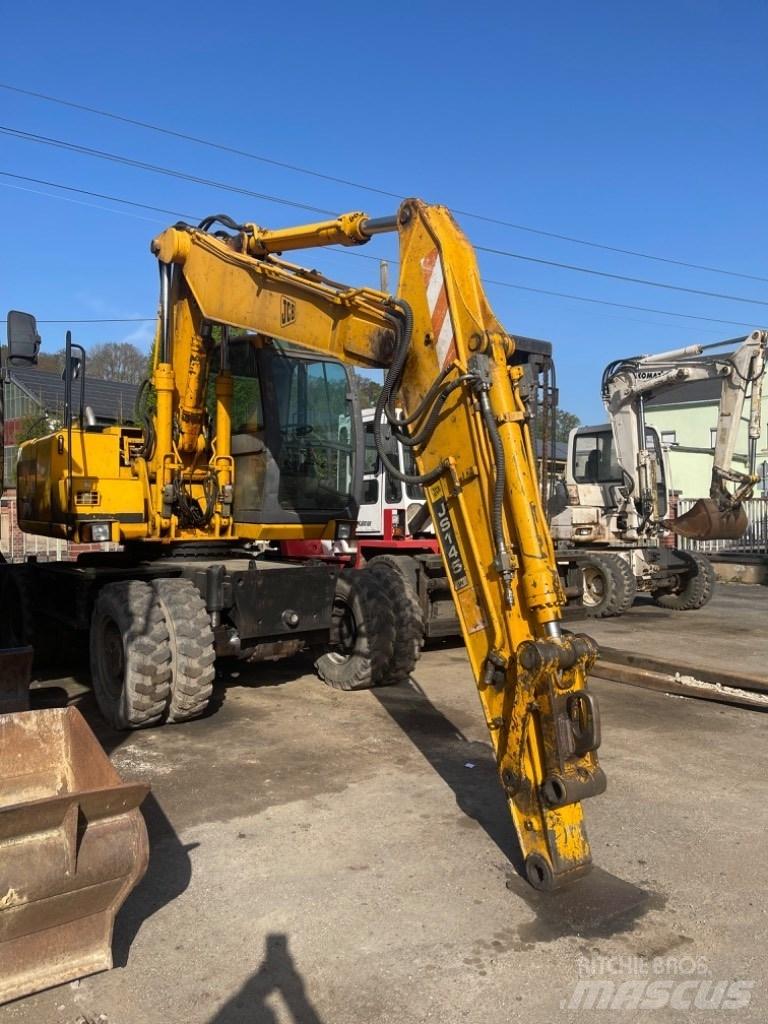 JCB JS 145 W حفارات بعجل