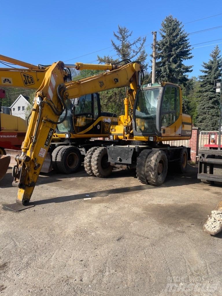 JCB JS 145 W حفارات بعجل