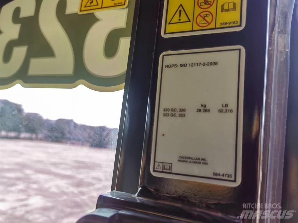 CAT 2022 CAT 323 حفارات بعجل