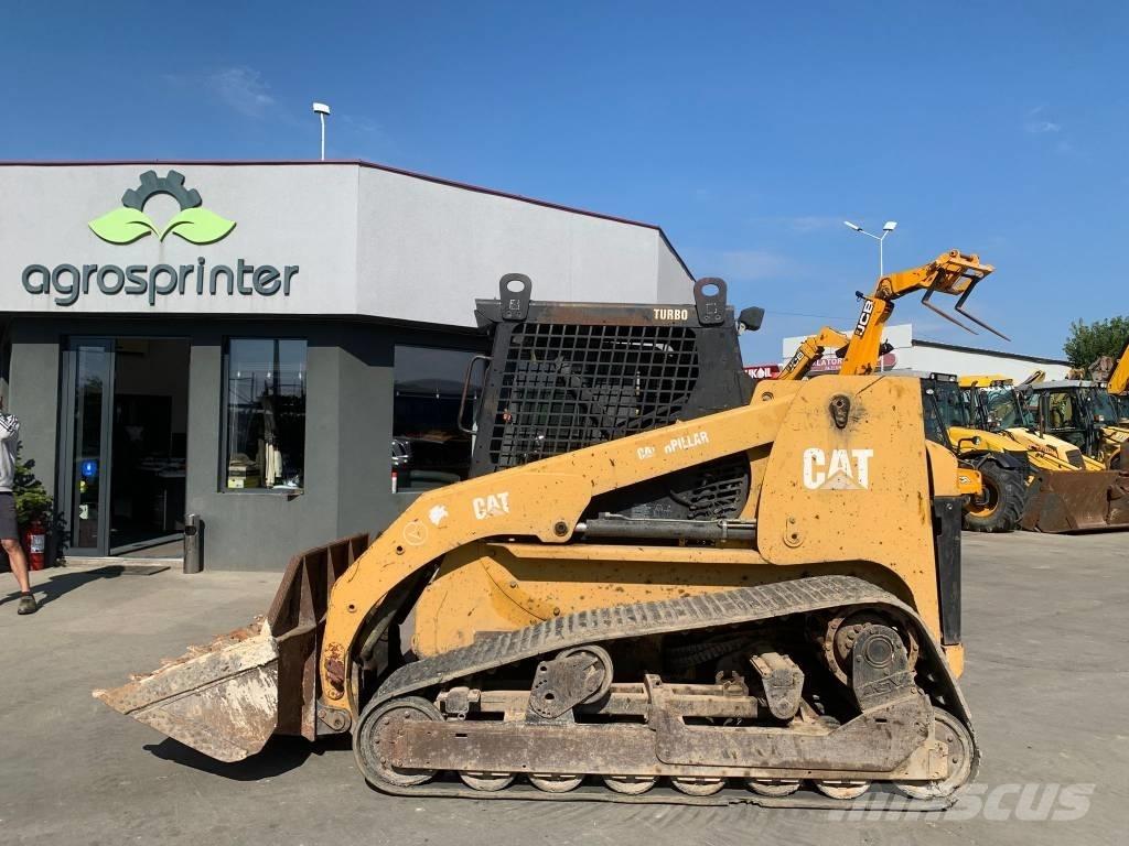 CAT 277 لوادر انزلاقية التوجيه
