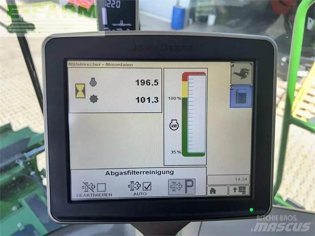 John Deere t560 حصادات