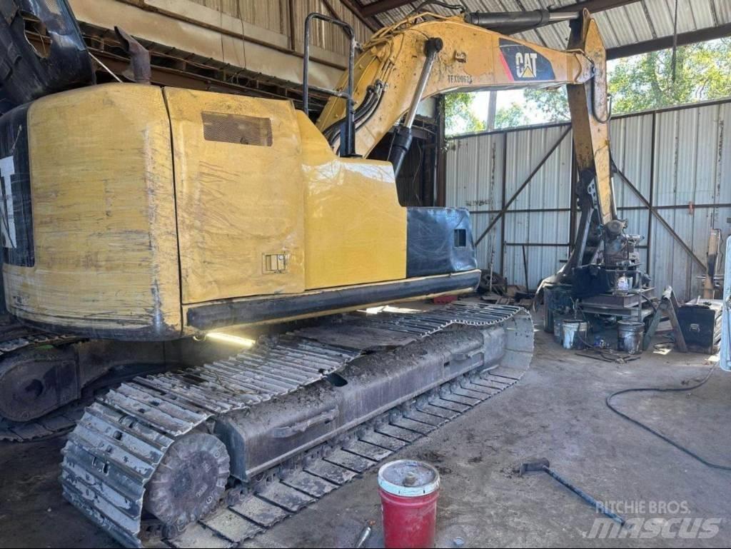 CAT 320 EL حفارات زحافة