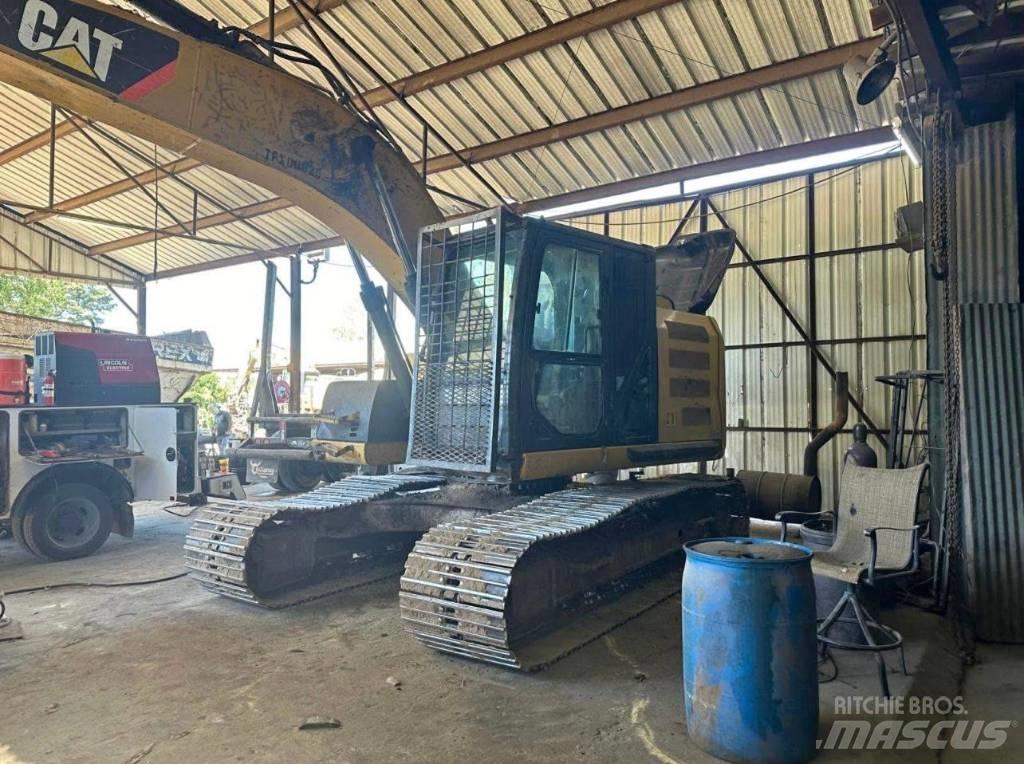 CAT 320 EL حفارات زحافة