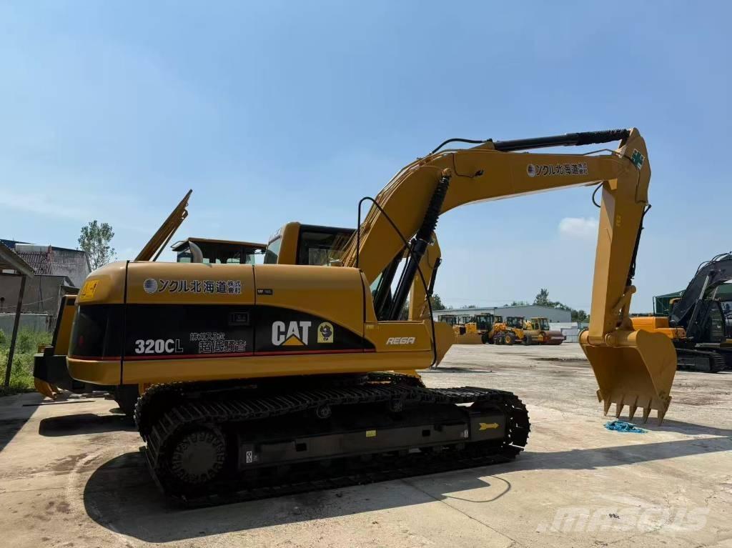 CAT 320 C L حفارات زحافة