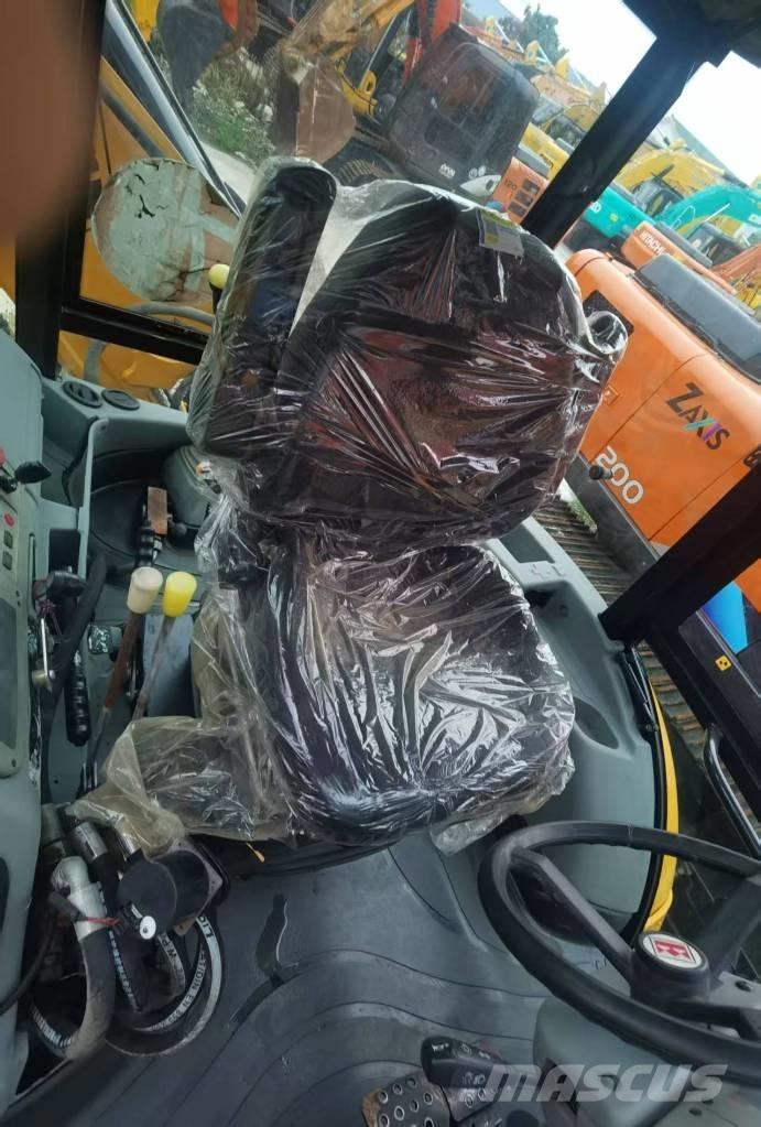 JCB 4 CX لوادر ذات جرافات عكسية